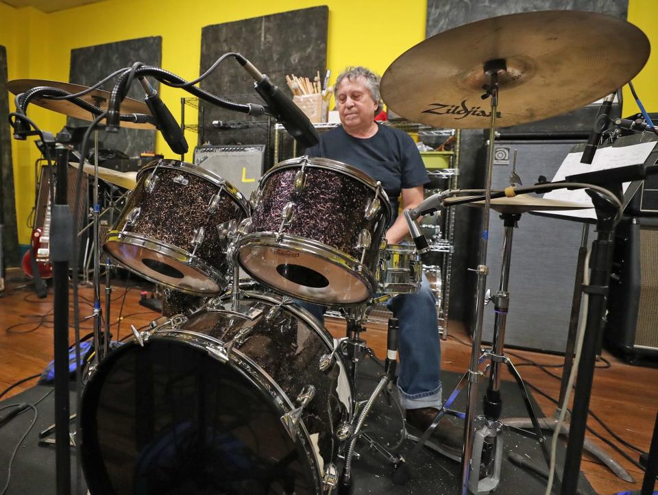 Akron musician Chris Butler plays drums on the vintage Slinglander kit he assembled. A member of Dave Rich and His Enablers, Butler has been with The Waitresses, Tin Huey, The Numbers Band and other groups.