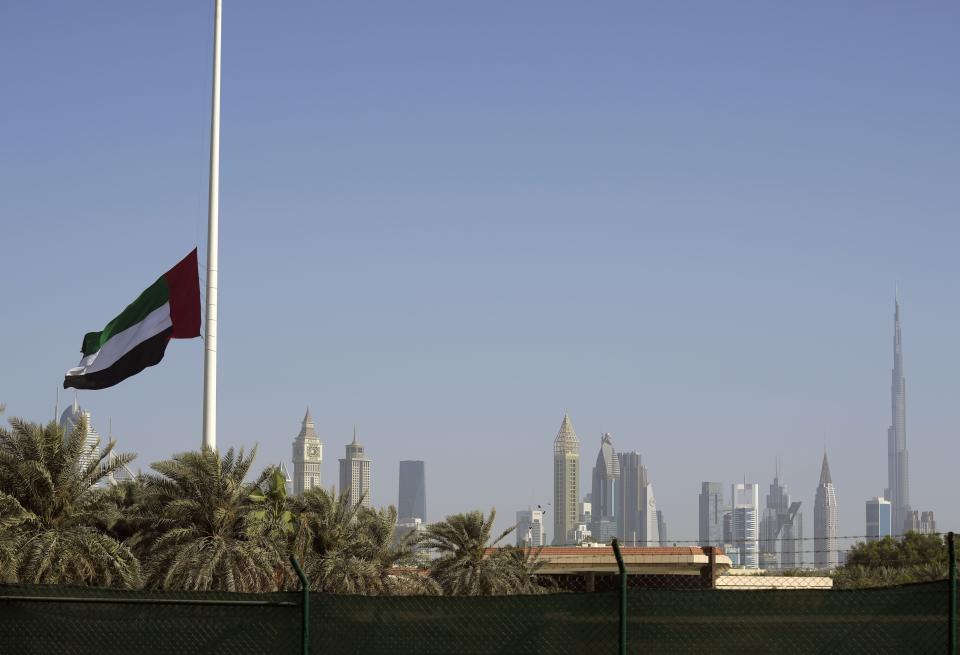 UAE national flag flies at half-staff after the announcement of the Emirates president's death, in Dubai, United Arab Emirates, Friday, May 13, 2022. Sheikh Khalifa died Friday, May 13, 2022, the government's state-run news agency announced in a brief statement. He was 73. (AP Photo/Kamran Jebreili)