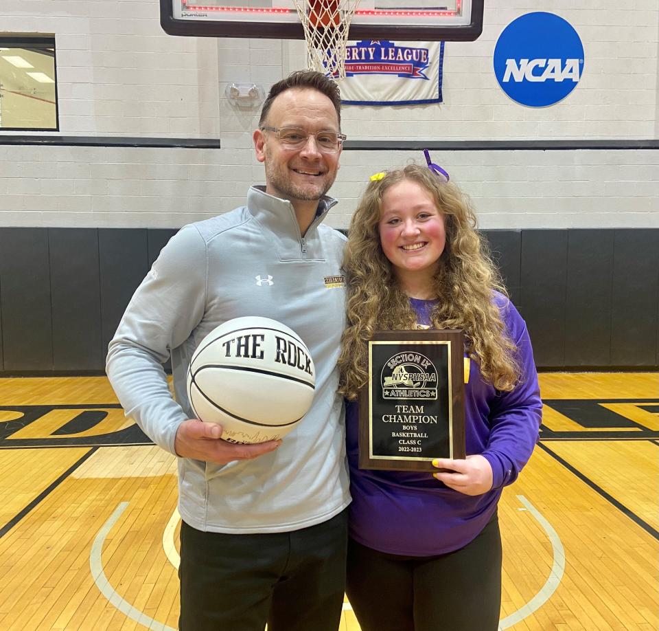 Rhinebeck boys basketball coach David Aierstok poses with his daughter, Brooke, after the Hawks won the Section 9 Class C championship on March 5, 2023.