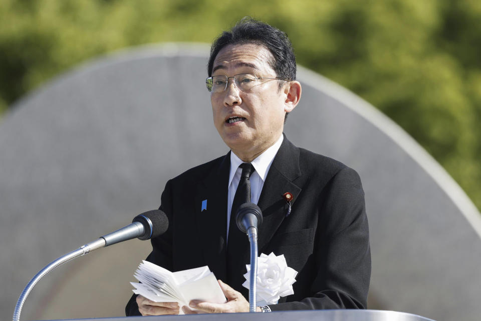 Japan's Prime Minister Fumio Kishida delivers a speech during a ceremony marking the 78th anniversary of the world's first atomic bombing at the Hiroshima Peace Memorial Park in Hiroshima, western Japan Sunday, Aug. 6, 2023. (Kyodo News via AP)