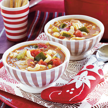 <p>Bacon, celery, zucchini, garlic, and tomatoes come together in this classic soup recipe. Super easy and delicious, this is sure to make your go-to comfort food list. <a href="https://www.myrecipes.com/recipe/minestrone-soup" rel="nofollow noopener" target="_blank" data-ylk="slk:View Recipe" class="link rapid-noclick-resp">View Recipe</a></p>