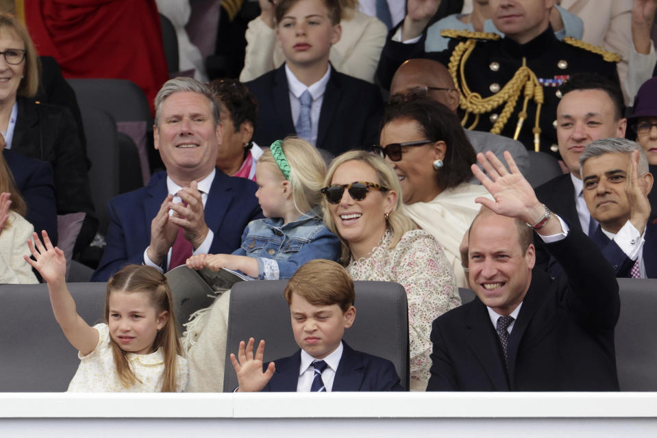 From left, Princess Charlotte, Prince George and Prince William watch the Platinum Jubilee Pageant, in London, Sunday June 5, 2022, on the last of four days of celebrations to mark the Platinum Jubilee.  / Credit: Chris Jackson / AP