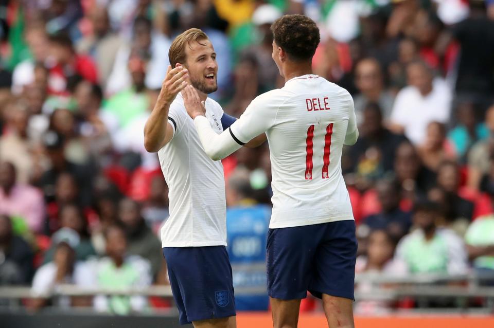 <p>England’s Harry Kane (left) celebrates scoring his side’s second goal of the game with Dele Alli </p>