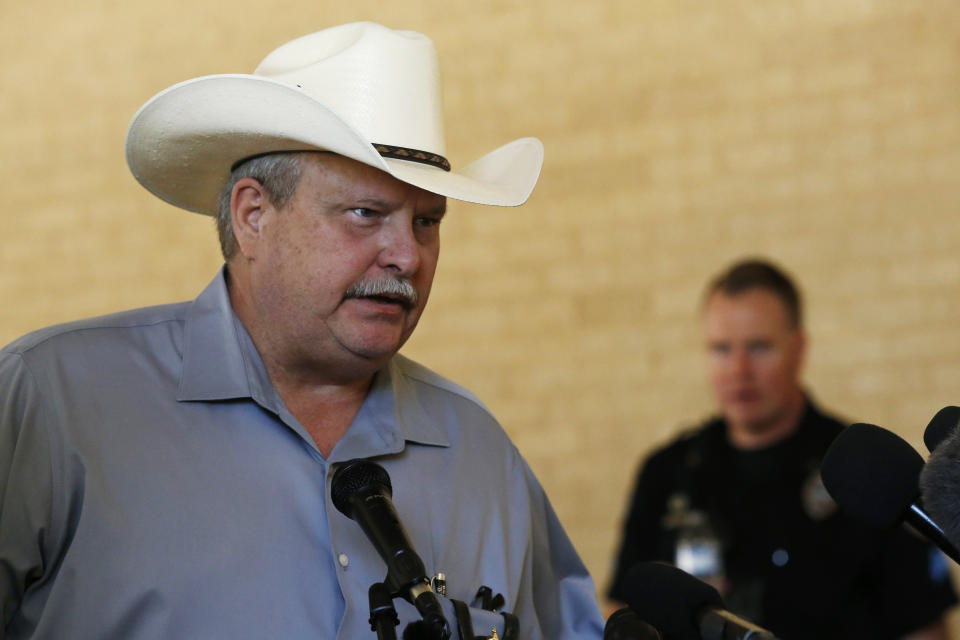 In this Monday, Sept. 2, 2019 photo Ector County, Texas Sheriff Mike Griffis speaks during a news conference, in Odessa, Texas. Griffis has said that Odessa, population 120,000, has struggled to keep up with the influx of new residents. (AP Photo/Sue Ogrocki)