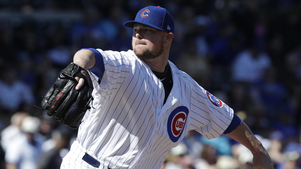 Jon Lester is working on a bounce pass to get over his throwing yips. (AP)