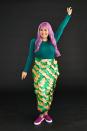 <p>Kids or adults, anyone can rock this homemade mermaid costume made from cupcake liners attached to an apron.</p><ol><li>Fold cupcake liners in half.</li><li>Starting at the bottom of the apron attach the straight folded part of the cupcake liner with a line of hot glue having the rounded part facing down. </li><li>Alternate the 2 colors to fill the entire width of the apron.</li><li>Start gluing another layer of cupcake liners making sure they overlap the first line.</li><li>Repeat until you have covered the entire apron.</li><li>Tie around waste pop on your wig and your good to go!</li></ol>