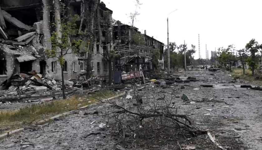 In this photo provided by the Luhansk region military administration, damaged residential buildings are seen in Lysychansk, Luhansk region, Ukraine, early Sunday, July 3, 2022. Russian forces pounded the city of Lysychansk and its surroundings in an all-out attempt to seize the last stronghold of resistance in eastern Ukraine's Luhansk province, the governor said Saturday. A presidential adviser said its fate would be decided within the next two days. (Luhansk region military administration via AP)