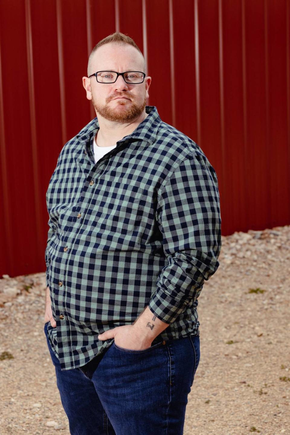 Russ Toomey sits for a portrait at his home in Tucson, Arizona. Toomey, a professor of family studies and human development at the University of Arizona, has helped establish that fact through his research on the mental health of transgender youth.