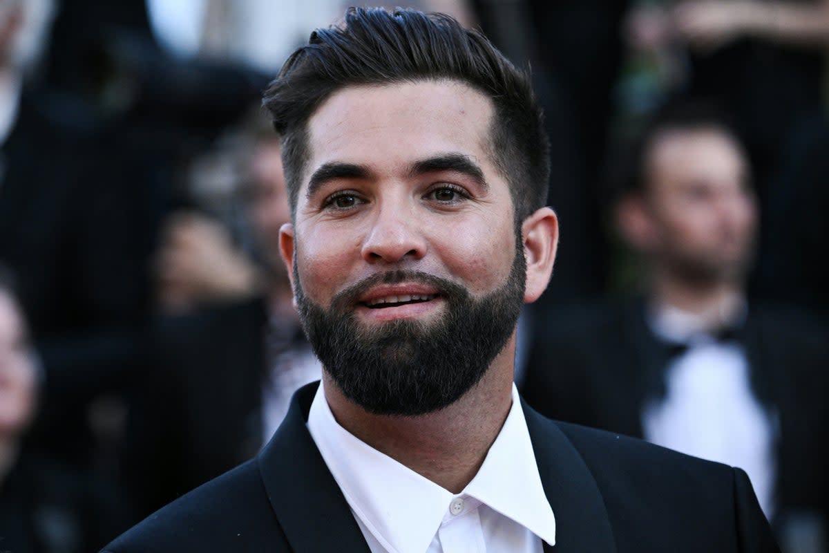 French singer Kendji Girac pictured at Cannes Film Festival in 2022 (AFP via Getty Images)