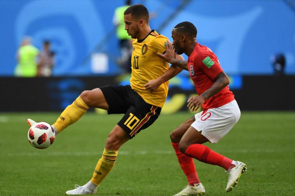 Total support: Eden Hazard, in World Cup action against Raheem Sterling (AFP/Getty Images)