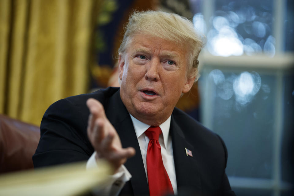 In this Oct. 16, 2018 photo, President Donald Trump speaks during an interview with The Associated Press in the Oval Office of the White House in Washington. (AP Photo/Evan Vucci)