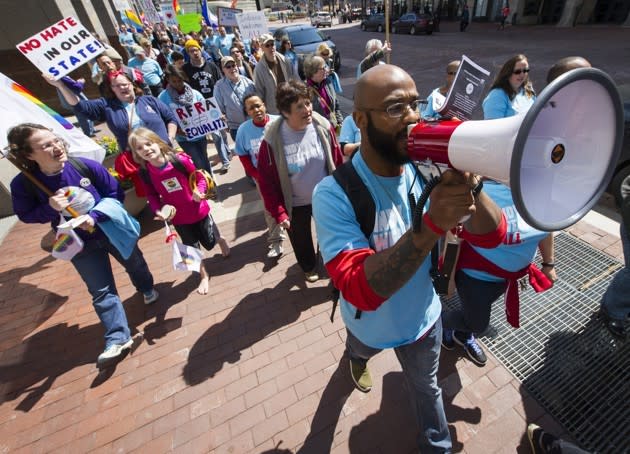 People protest the Religious Freedom Restoration Act in Indianapolis (Doug McSchooler / AP)