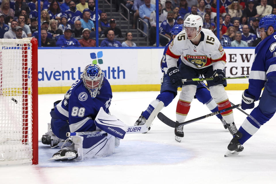Florida Panthers' Anton Lundell (15) scores past Tampa Bay Lightning goaltender Andrei Vasilevskiy during the first period of an NHL hockey game Tuesday, Feb. 28, 2023, in Tampa, Fla. (AP Photo/Mike Carlson)