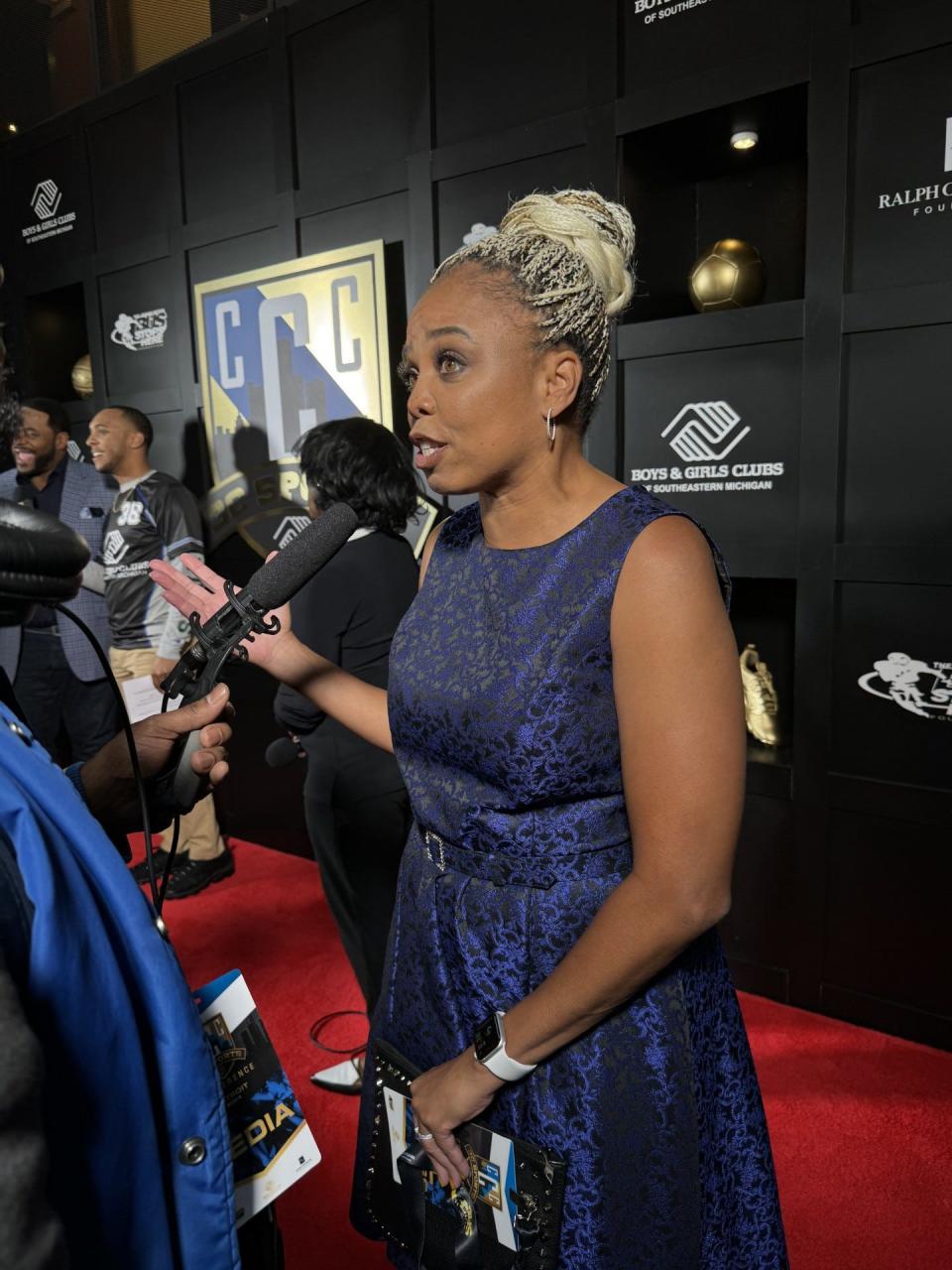 Journalist Jemele Hill talks to a member of the media on the red carpet Wednesday, April 24 outside the Garden Theater in Midtown Detroit during a VIP event to kick off a conference focusing on youth sports organized by the Boys and Girls Clubs of Southeastern Michigan.