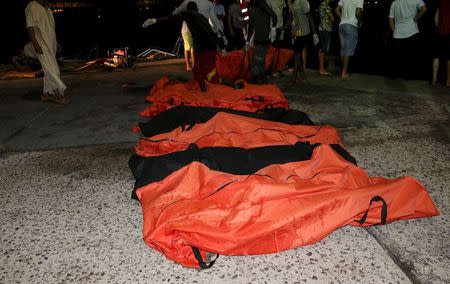 A view of the bodies of of dead migrants that were recovered by the Libyan coastguard after a boat sank off the coastal town of Zuwara, west of Tripoli, August 27, 2015. REUTERS/Hani Amara