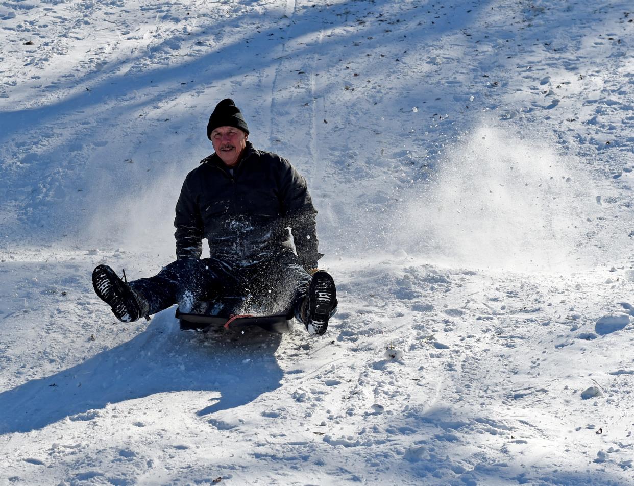 Many kids and their families went to Elks Lodge 817 to slide down the hill Tuesday, Jan. 4, 2022, in Salisbury, Maryland.