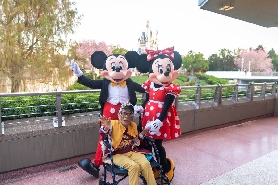 Mickey Mouse and Minnie Mouse enjoy a celebratory moment with Magnolia Jackson on Wednesday during a Walt Disney World Resort celebration of Jackson’s 106th birthday in Lake Buena Vista Fla. Born March 14, 1918, Jackson, the oldest living graduate of Bethune-Cookman University in nearby Daytona Beach, experienced the magic of Walt Disney World for the first time along with family and friends. The festivities included dozens of Disney cast members, executives, colorful balloons and a huge birthday cake. Afterwards, she toured the Disney theme parks, including embracing her life-long love of gardening by attending the EPCOT International Flower & Garden Festival. (Bennett Stoops, Photographer)
