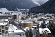 The Davos Congress Centre is prepared for the World Economic Forum in Davos, Switzerland, Sunday, Jan. 19, 2020. The 50th annual meeting of the forum will take place in Davos from Jan. 20 until Jan. 24, 2020. (AP Photo/Markus Schreiber)