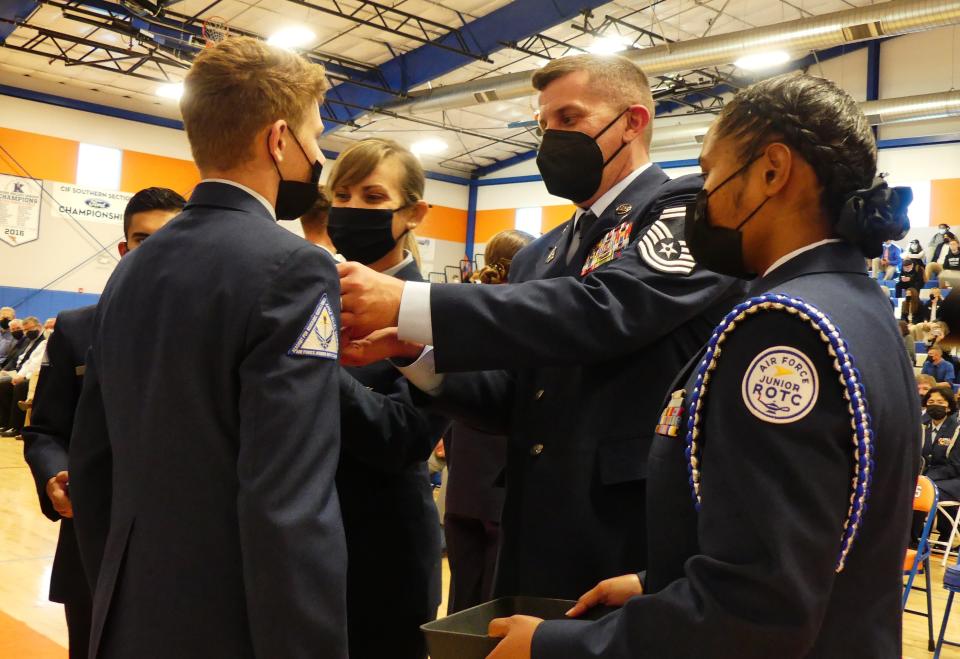 Space Force Junior ROTC cadets on Tuesday received lapel pins as the Academy for Academic Excellence became one of the first schools in the nation to join the Space Force Junior ROTC Program.