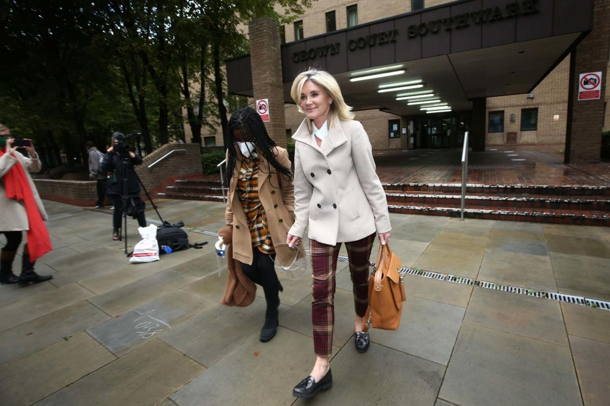 Former Blue Peter presenters Diane-Louise Jordan (left) and Anthea Turner leave Southwark Crown Court in London after giving evidence in the trial of John Leslie: PA