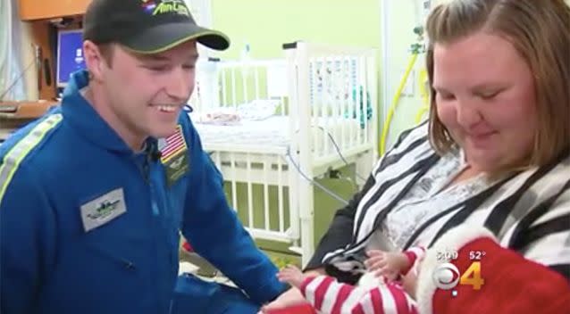 The AirLife flight nurse being reunited with baby Cayden. Source: KCNC-TV