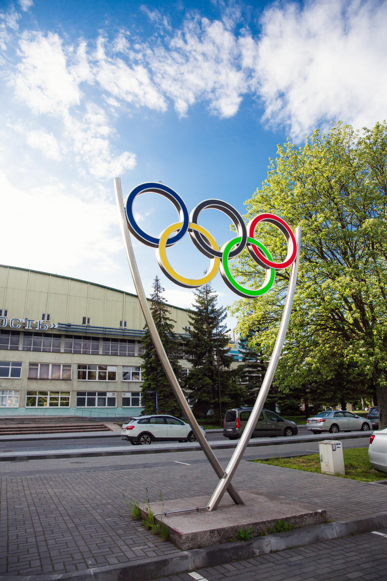 Sign of Olympic rings, symbol of Olympics in urban environment.