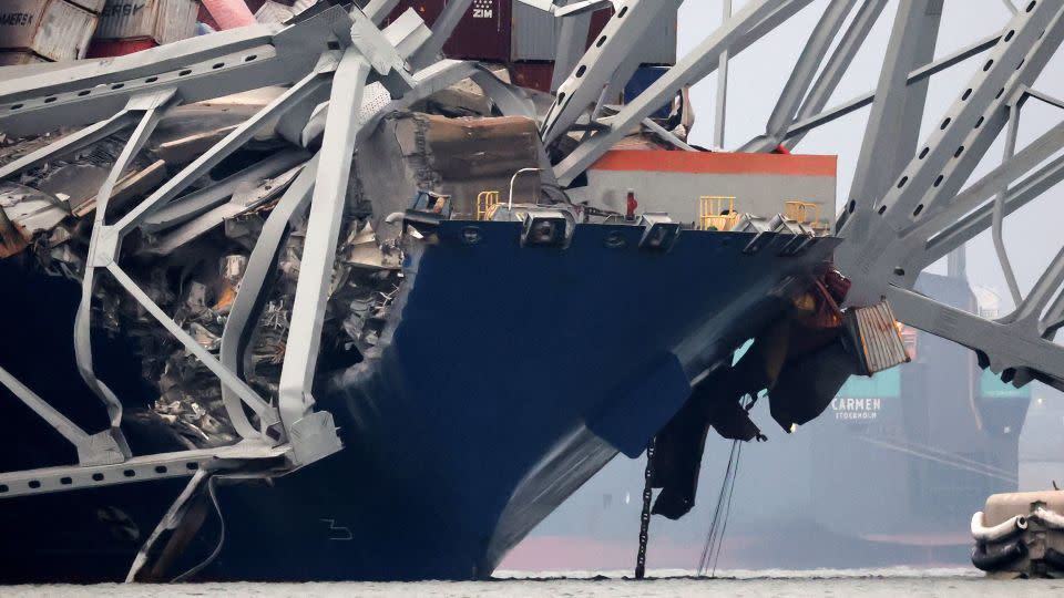 The Dali cargo ship is seen a day after crashing into the Francis Scott Key Bridge in Baltimore on Tuesday. - Mike Segar/Reuters