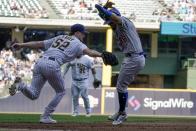 Milwaukee Brewers' Eric Lauer tags out Chicago Cubs' Rafael Ortega after being caught in a rundown during the fifth inning of a baseball game Sunday, Sept. 19, 2021, in Milwaukee. (AP Photo/Morry Gash)
