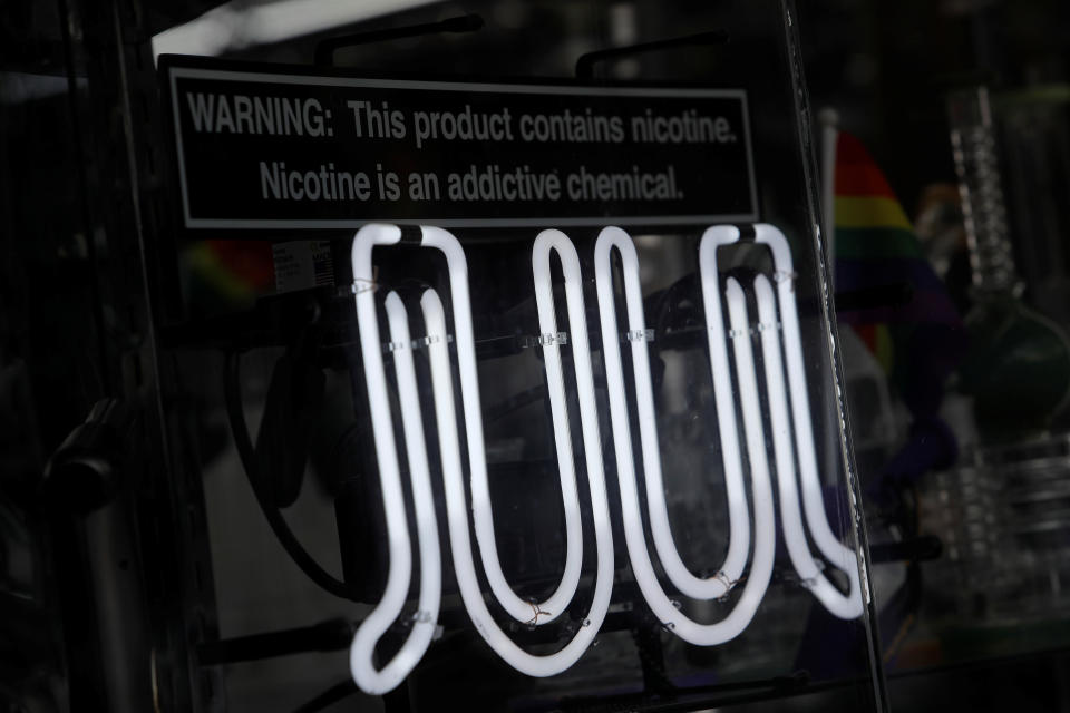Signage for Juul vaping products is seen on a storefront in New York City, U.S., September 9, 2019. REUTERS/Andrew Kelly