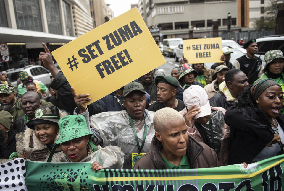 FILE — Supporters of former South African President Jacob Zuma and the UMkhonto WeSizwe (MK) party outside the Electoral High Court in Johannesburg Monday April 8 2024. For the first time since 1994, the ruling African National Congress (ANC) might receive less than 50% of votes after Zuma stepped down in disgrace in 2018 amid a swirl of corruption allegations and has given his support to the newly-formed political party. (AP Photo/File)