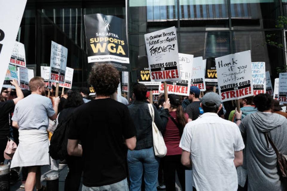 Members of the Writers Guild of America (WGA) East walk on the picket-line outside of HBO and Amazon’s offices on 10 May 2023 (Getty Images)