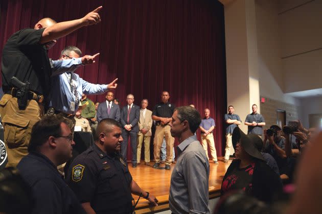 Democratic gubernatorial candidate Beto O'Rourke interrupts Texas Gov. Greg Abbott during a press conference on the Uvalde school shooting on May 25, 2022. (Photo: ALLISON DINNER via Getty Images)