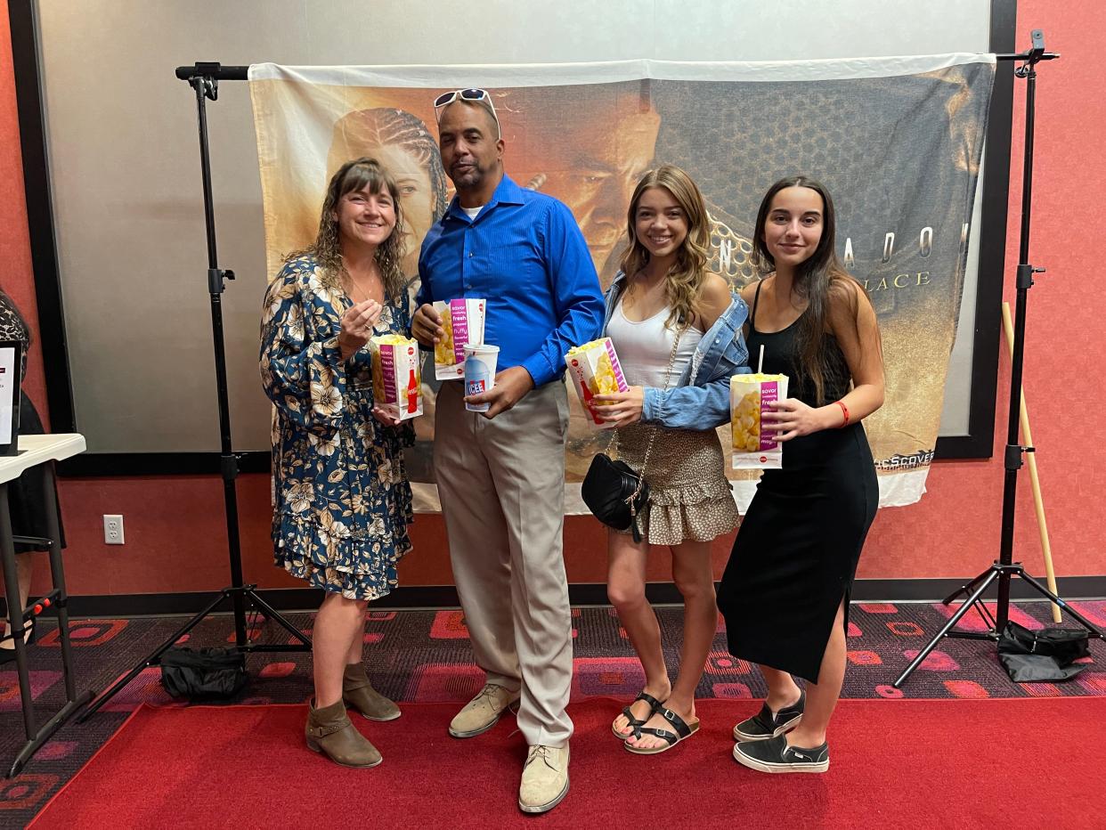 Left to right, Angie, John and Alexis Miller join Kayleigh Safahi during the red-carpet screening of the sci-fi film UNSHADOW: Hiding Place on Sunday at the AMC theater in Apple Valley.