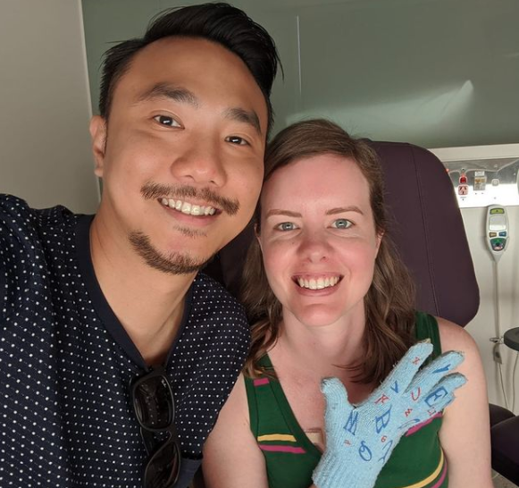 Justin Tham and Sarah Foster pose for a picture in hospital. 