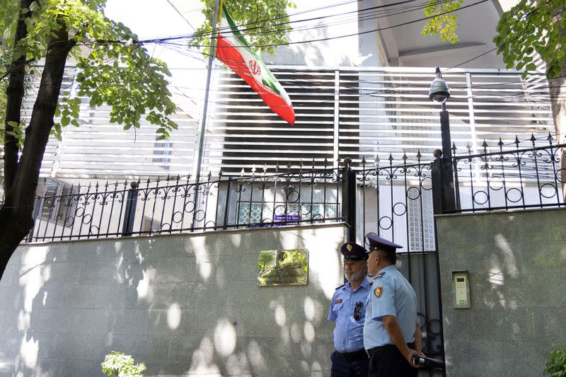 Police officers stands in front of the Embassy of the Islamic Republic of Iran in Tirana