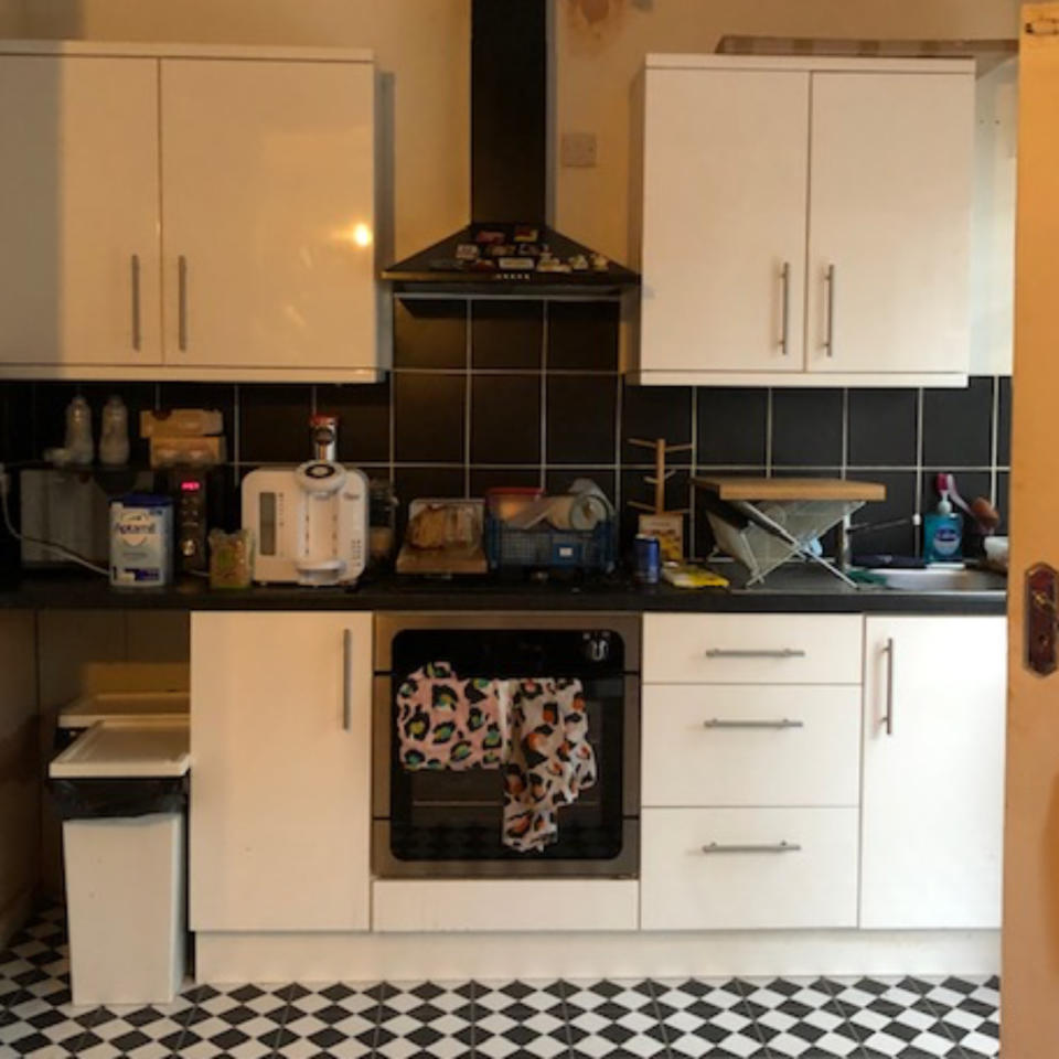 before picture of a monochrome kitchen with black and white tiles