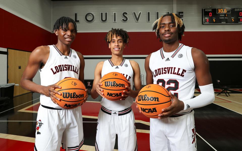 U of L basketball freshmen, from left; Devin Ree (0), Fabio Basili (11) and Kamari Lands (22) on media day at the Kueber Center practice facility in Louisville, Ky. on Oct. 20, 2022.