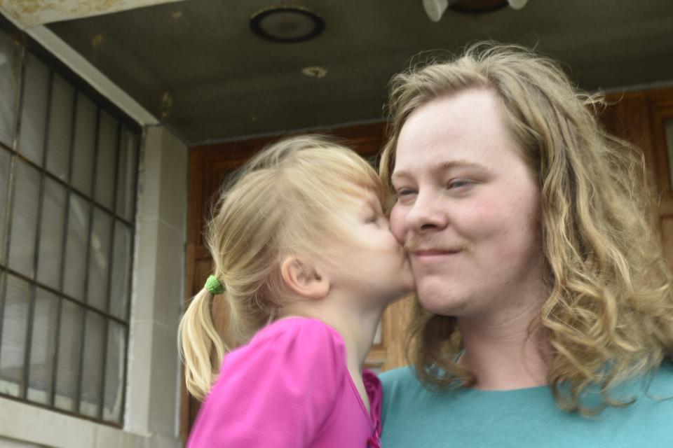 Four-year-old Virginia Bowman and her dad survived the March 31 tornado that destroyed their Owen County house.