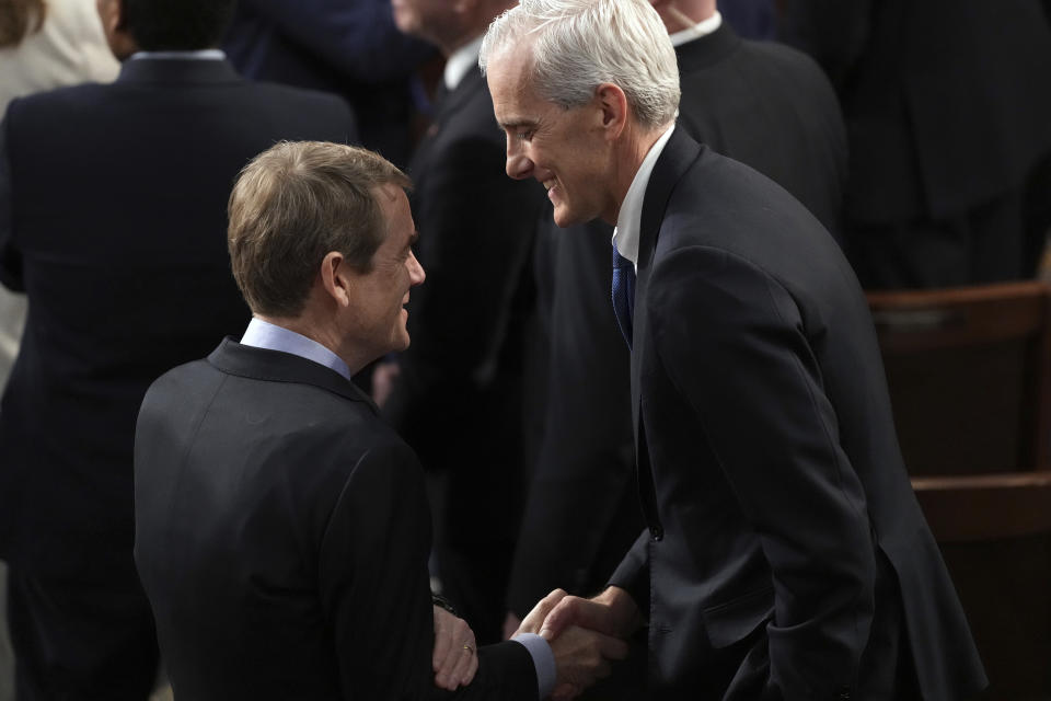 Sen. Michael Bennet, D-Colo., talks with Veterans Affairs Secretary Denis McDonough after President Joe Biden delivered the State of the Union address to a joint session of Congress at the U.S. Capitol, Thursday March 7, 2024, in Washington. (AP Photo/Andrew Harnik)