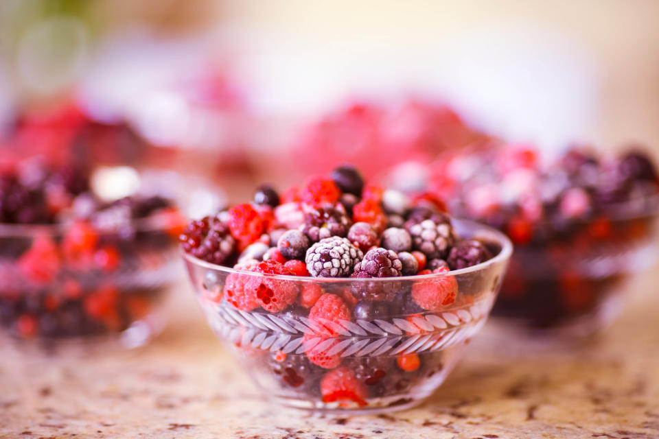 Glass Bowl with Frozen Summer Fruit Berries.