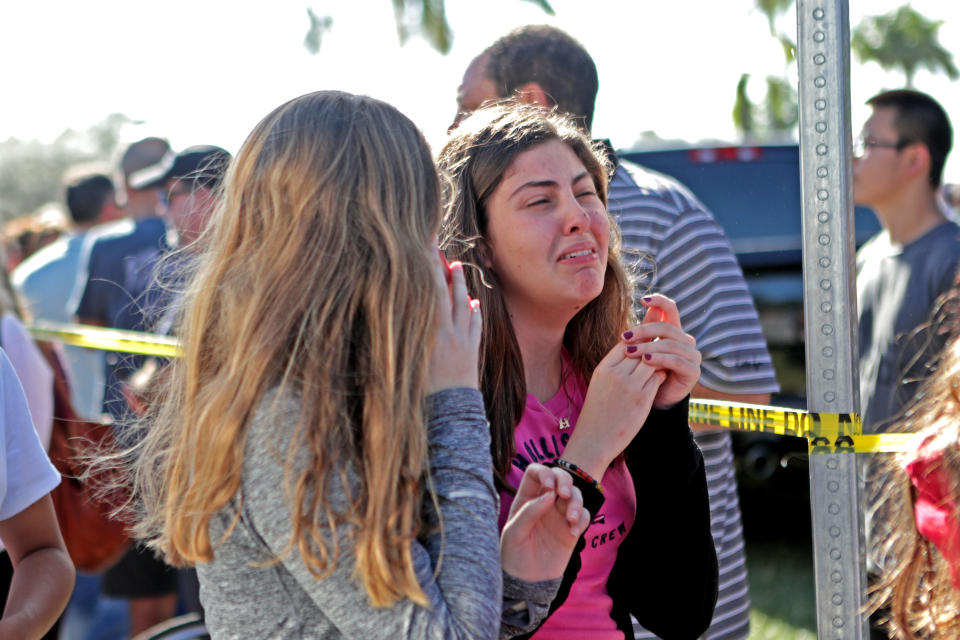 Students are released from a lockdown outside of Stoneman Douglas High School.