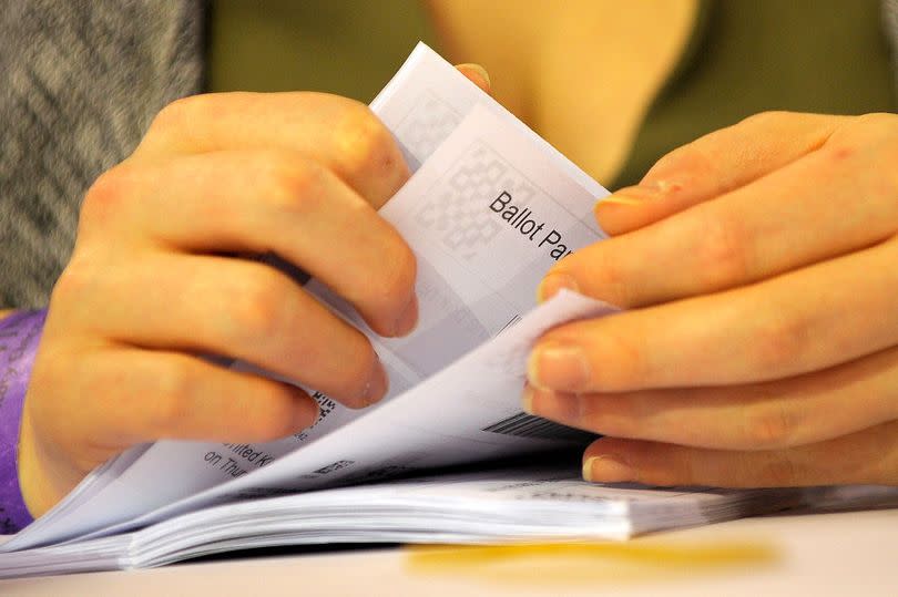 A member of staff counts ballots at the main Glasgow counting centre in Emirates Arena in Glasgow, Scotland, on June 8, 2017, after the polls closed in Britain's general election.
Prime Minister Theresa May is poised to win Britain's snap election but lose her parliamentary majority, a shock exit poll suggested June 8, in what would be a major blow for her leadership as Brexit talks loom. / AFP PHOTO / Andy Buchanan        (Photo credit should read ANDY BUCHANAN/AFP via Getty Images)