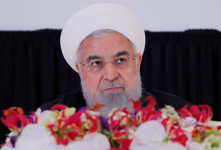 FILE PHOTO: Iranian President Hassan Rouhani listens during a news conference at the United Nations General Assembly in New York, September 26, 2018. REUTERS/Brendan Mcdermid/File Photo