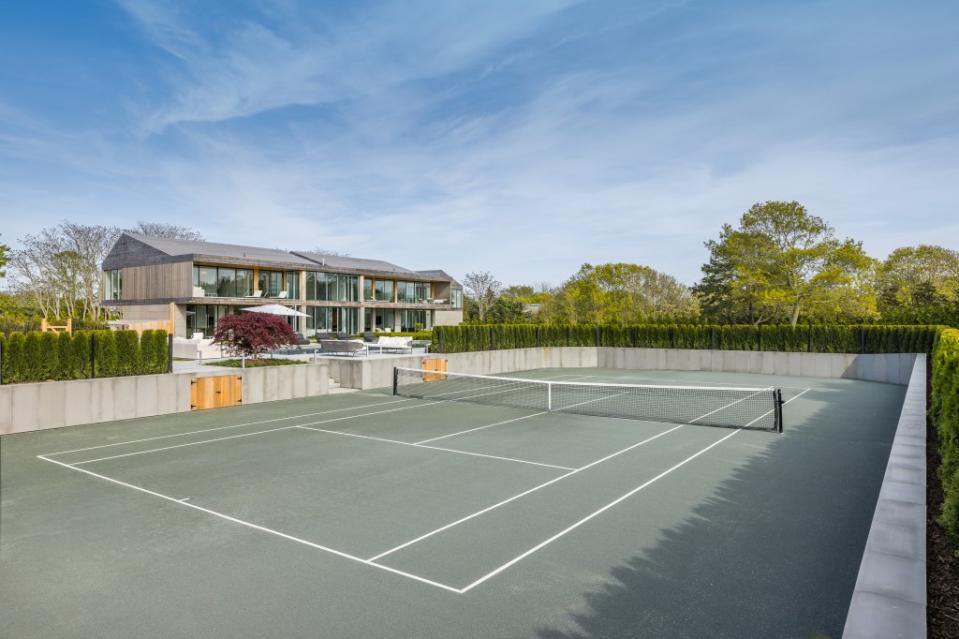 The tennis court. Hedgerow Exclusive Properties