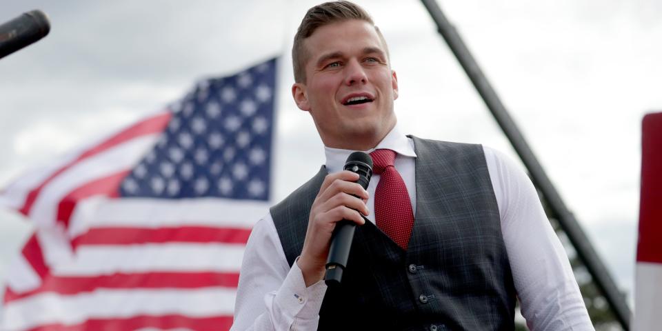U.S. Rep. Madison Cawthorn, R-N.C., speaks to the crowd before former President Donald Trump takes the stage at a rally Saturday, April 9, 2022, in Selma, N.C.