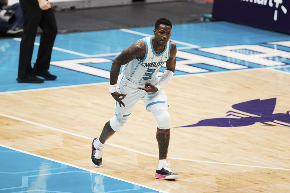 Charlotte Hornets guard Terry Rozier (3) reacts after making a three-point basket during the first half of an NBA basketball game against the New Orleans Pelicans, Sunday, May 9, 2021, in Charlotte, N.C. (AP Photo/Brian Westerholt)