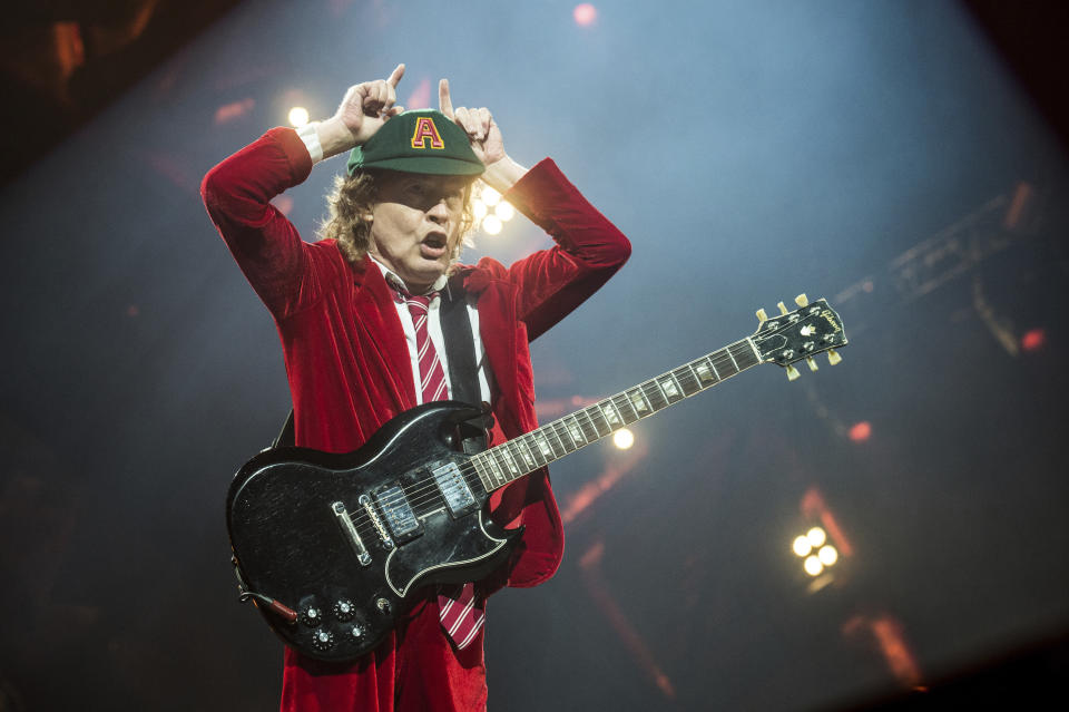 FILE - Angus Young, of AC/DC, performs at Nationwide Arena on Sept. 4, 2016, in Columbus, Ohio. After 47 years, the band is releasing its 17th studio album, “Power Up,” on Friday. (Photo by Amy Harris/Invision/AP, File)