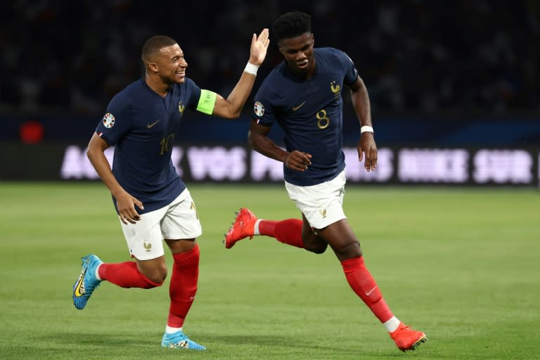 Aurelien Tchouameni celebrates with Kylian Mbappe after putting France ahead against Ireland (FRANCK FIFE)