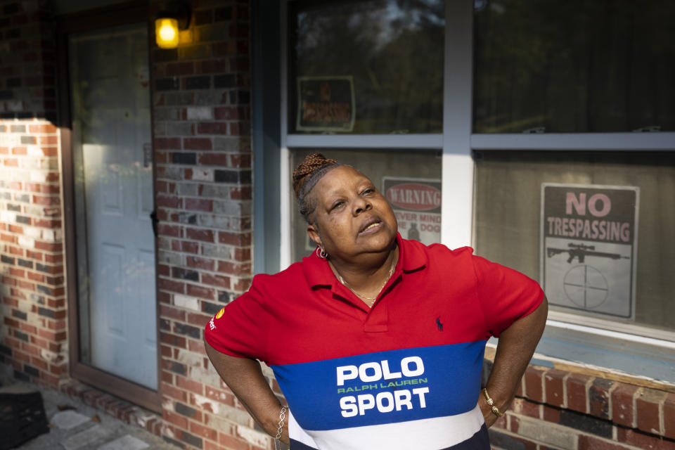 Georgia voter Cynthia Jones speaks in front of her home where she and her disabled sister live, Thursday, Nov. 3, 2022, in Atlanta. The Atlanta native sees a country split between haves and have nots. (AP Photo/John Bazemore)