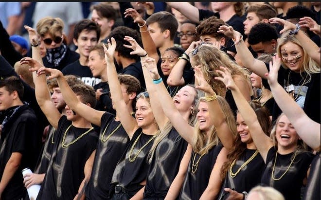 Shelby High School fans celebrate during a game.